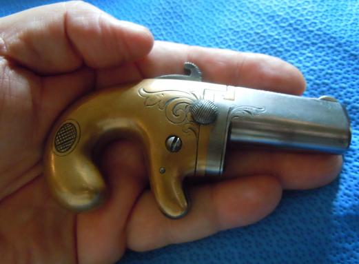 Early Moore No I all metal derringer manufactured by National Arms Company.