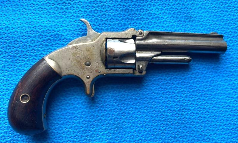 Marlin Model 1873 tip up revolver.